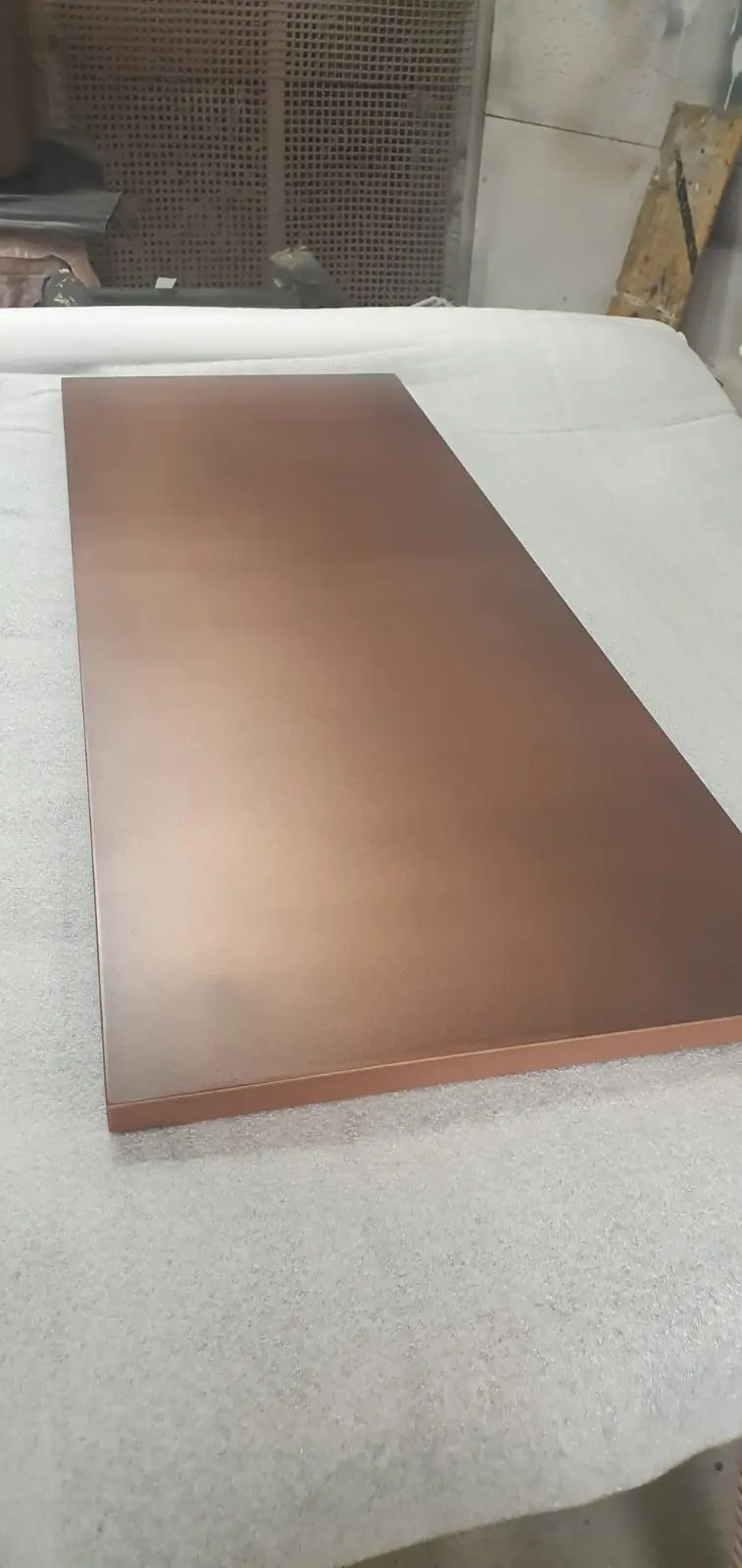 Polished liquid metal wall finish by Gréas Design, Dublin