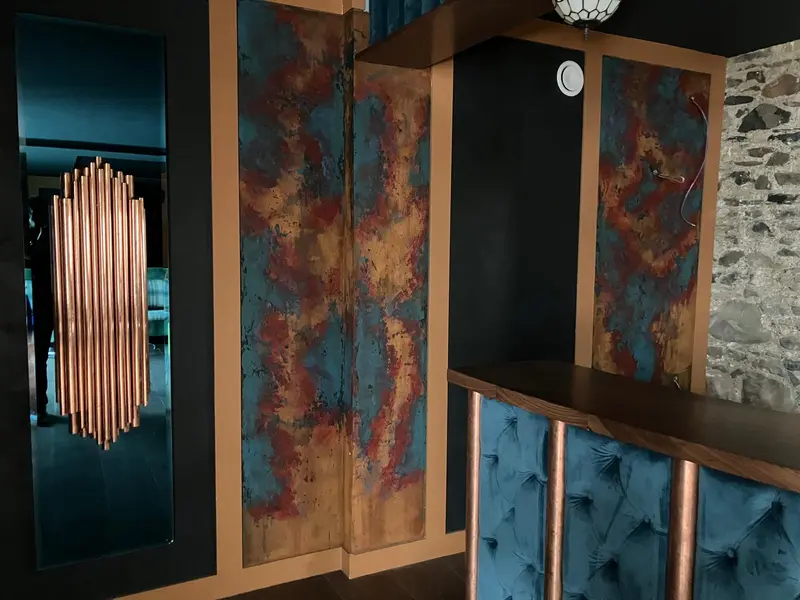 Hand-applied liquid metal architectural detail